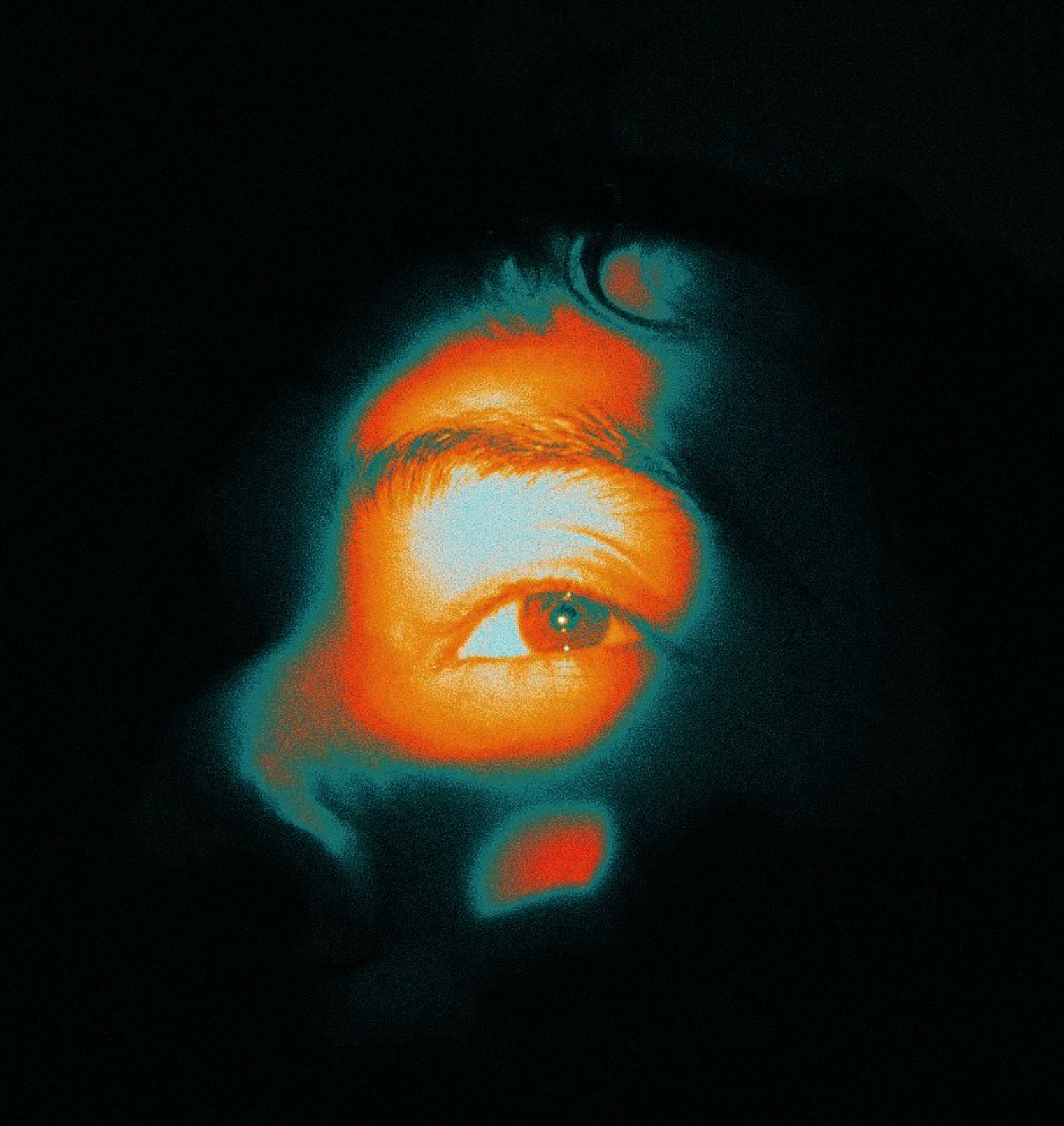 Close-up of a person's eye with a dark background