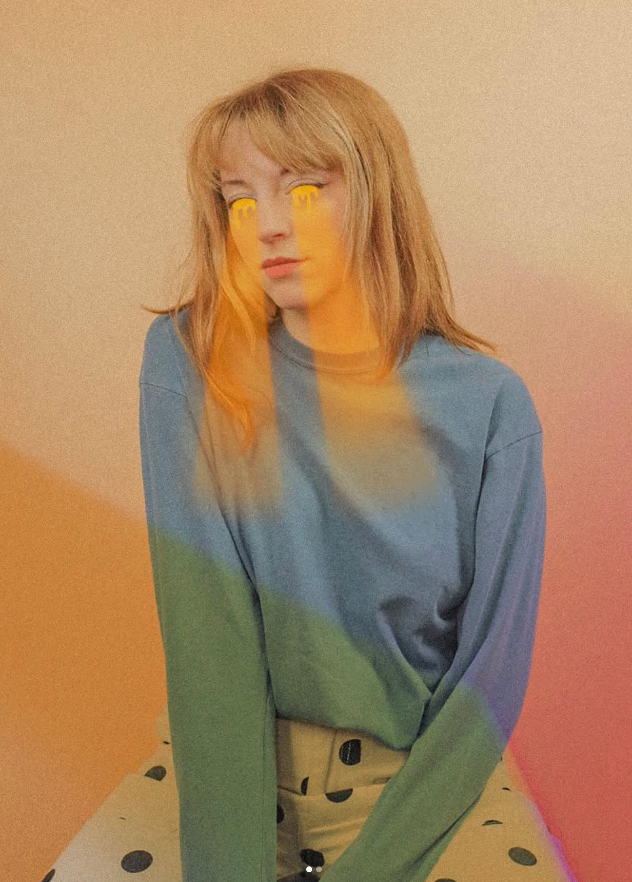 studio portrait of woman with flashlight eyes effect. vivid colors